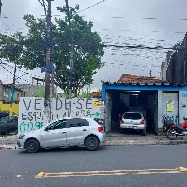 Terreno comercial com casa